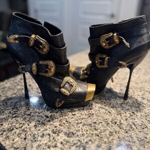 Elegant Black Stiletto Boots with Gold Buckles